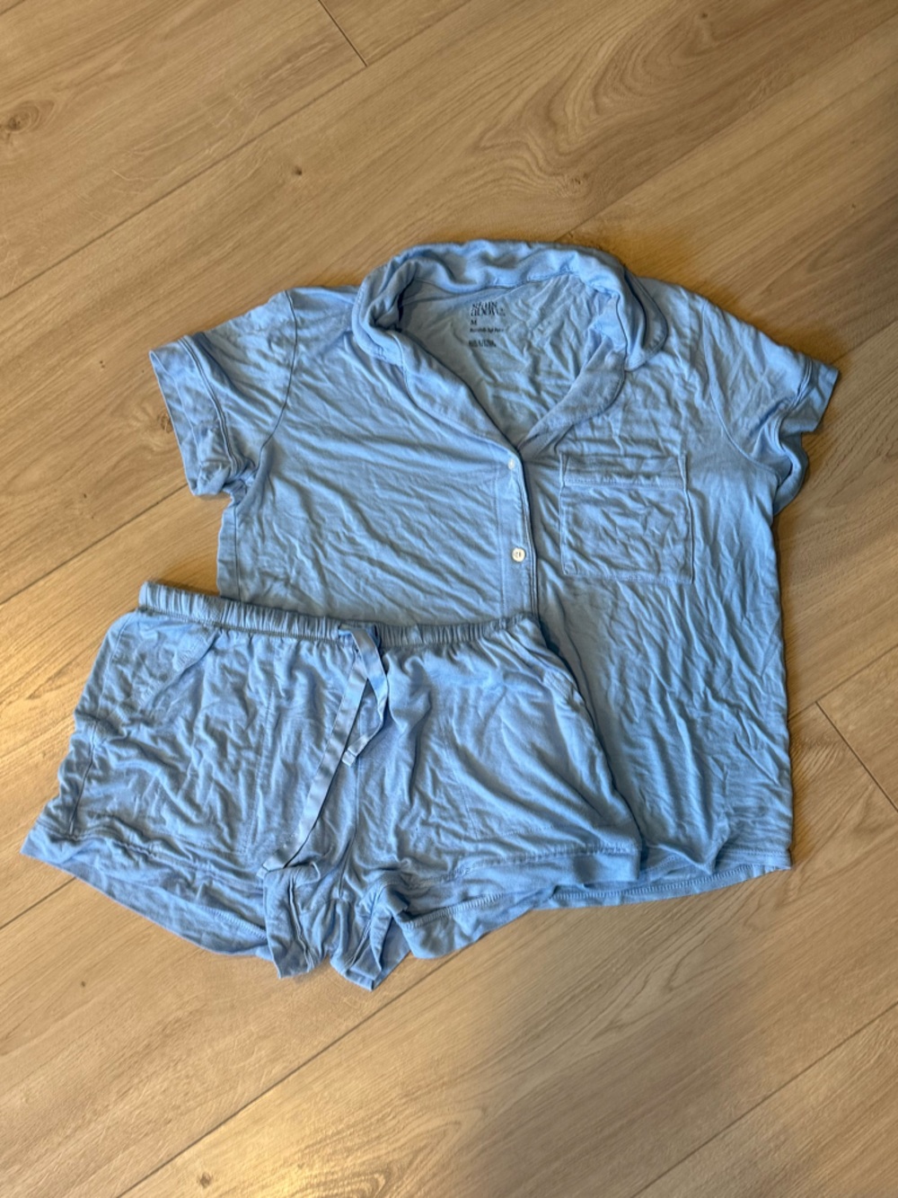 stars above light blue casual tee